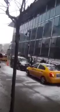 Dangerous threat of snow melting on the roof, happened in Erzurum, Turkey yesterday, Jan 11th. 