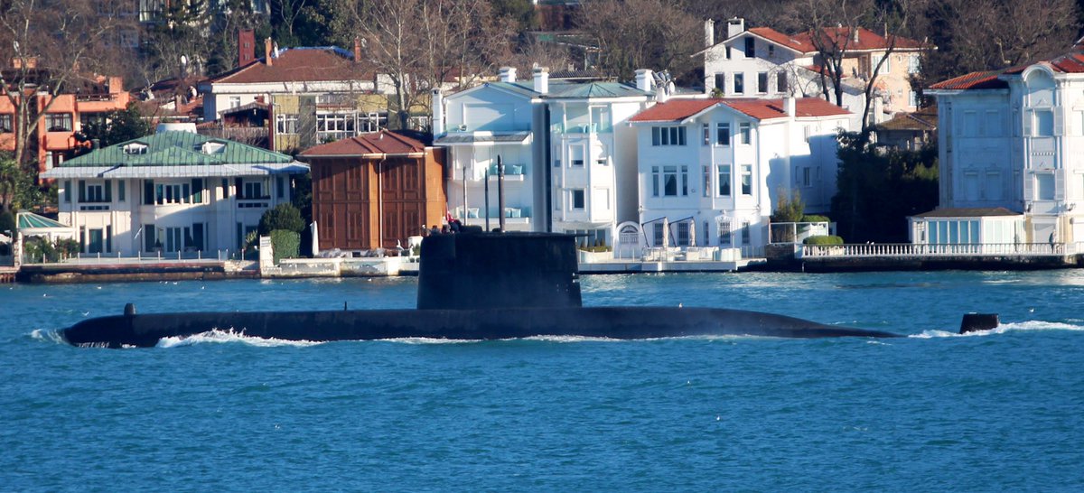 Turkish Navy type 209/1400 Preveze class submarine transits Bosphorus towards the Black Sea.   