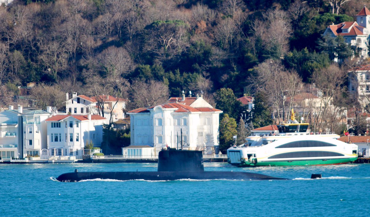 Turkish Navy type 209/1400 Preveze class submarine transits Bosphorus towards the Black Sea.   