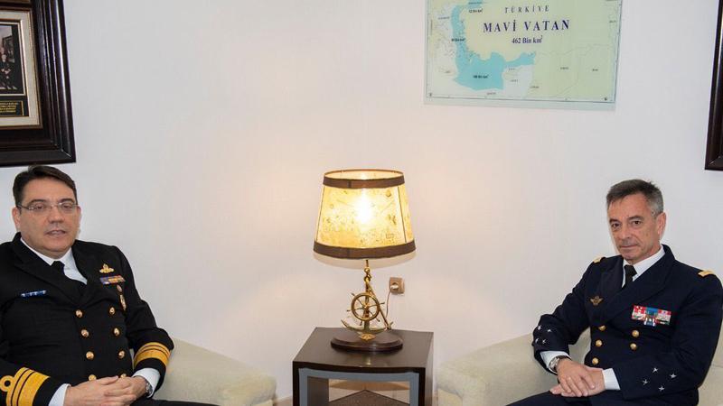 Turkey's blue homeland map for Mediterranean Sea on the wall during the meeting between Turkish officials and the Vice Admiral Laurent Isnard, Mediterranean Region Commander of French Navy.  