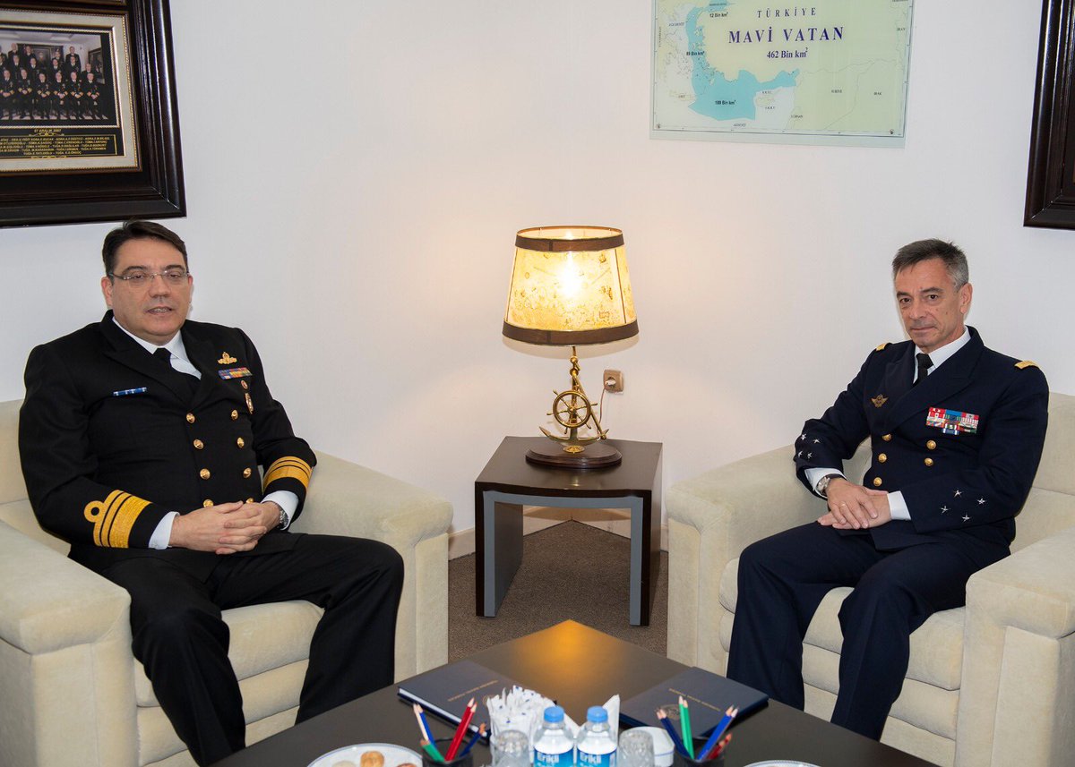 Turkey's blue homeland map for Mediterranean Sea on the wall during the meeting between Turkish officials and the Vice Admiral Laurent Isnard, Mediterranean Region Commander of French Navy.  