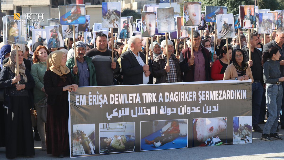 People of Kobani in northern Syria protest against Turkey's airstrikes on NE Syria